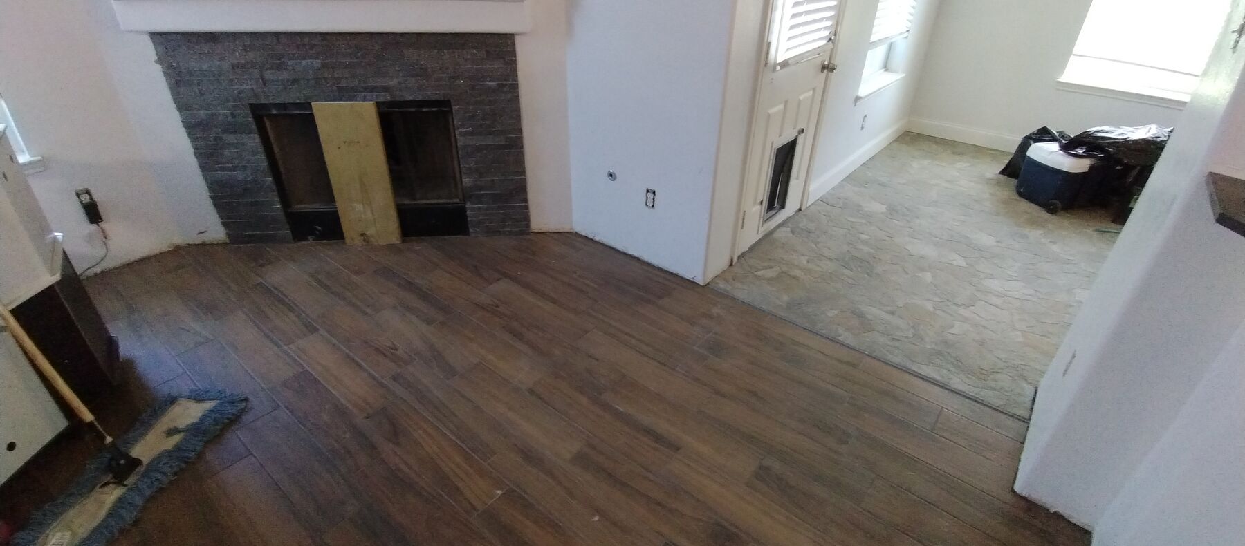HRH Repairs fireplace and interior flooring project